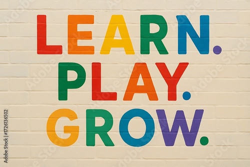 Brightly colored wooden letters spell learn play grow on a light wood background