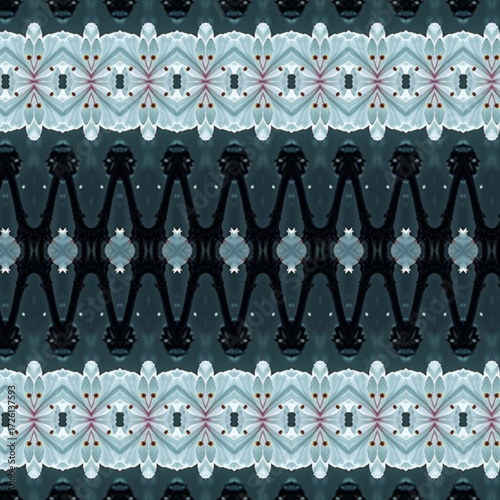Kaleidoscopic pattern with icy blue floral shapes and dark geometric lines, perfect for abstract backgrounds or textile designs.
