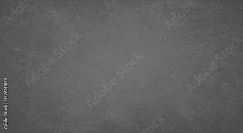 A textured gray surface with subtle variations in tone and shading