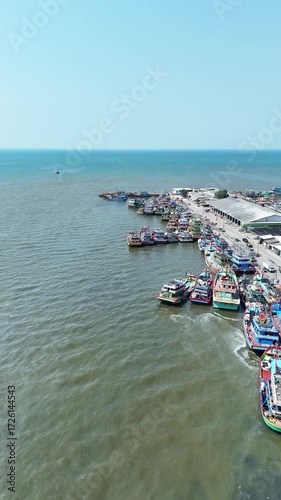 Aerial Panorama of a Bustling Harbor with Colorful Fishing Boats