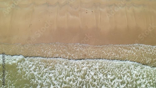 Aerial footage of wave at the beach