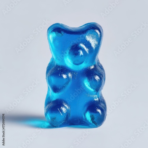 Vibrant Blue Gummy Bear, Studio Close-up, Simple Composition.