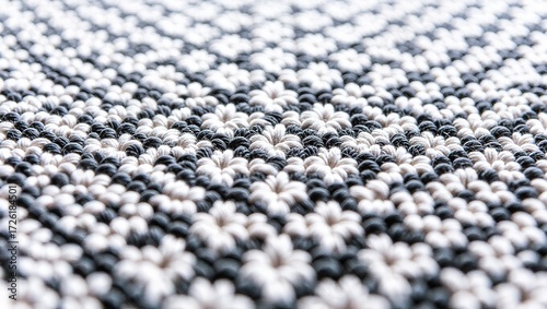 Intricate Black and White Woven Pattern with Textured Knots and