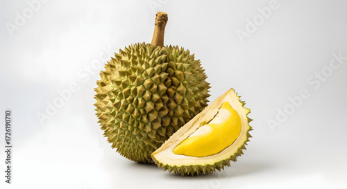 Exotic tropical durian fruit, renowned for its unique creamy texture and spiky exterior, presented whole and sectioned on a pristine white background