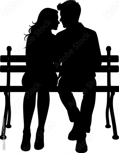 Silhouette of a couple intimately sitting on a park bench