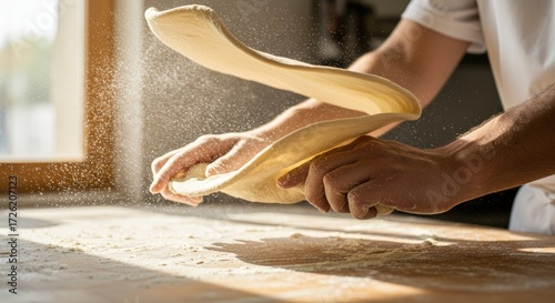 Chef preparing pizza dough
