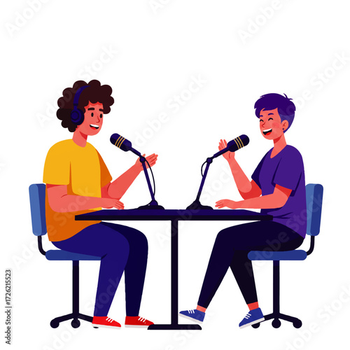 Two people are recording a podcast at a table with microphones, smiling and engaged in conversation.