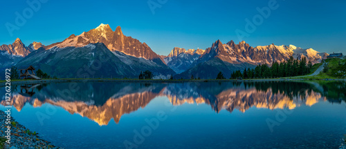 Mountain landscape of the Alps in Chamonix valley, France high resolution wide angle panoramic landscape. Alpine scenery in summer sunny weather on Tour du Mont Blanc, TMB trekking route