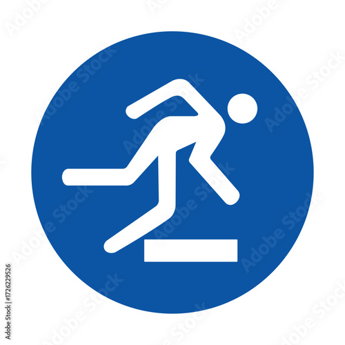 Sign indicating caution for people stepping over an obstacle on the ground