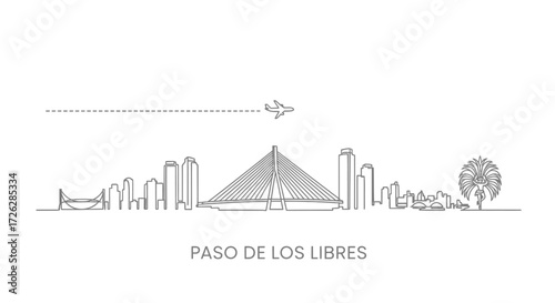 Paso de los Libres skyline with airplane and bridge