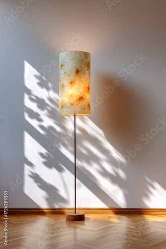 Elegant Lamp Casting Soft Shadows on Rustic Wooden Floor Creating a Warm Inviting Atmosphere Perfect for Cozy Living Spaces and Interior Design Inspiration