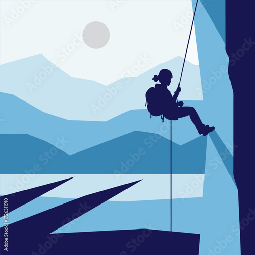 Silhouette of a Female Climber Rappelling Down a Mountain Cliff with a Scenic Lake and Mountains