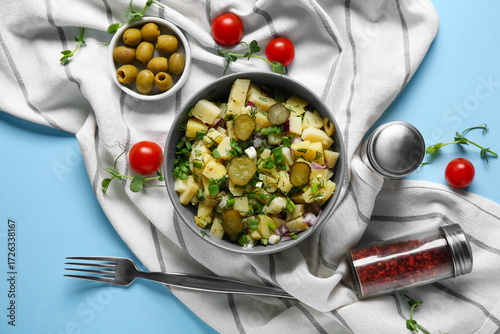 Bowl of tasty potato salad ...
