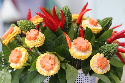 Flower vase made from vegetables and fruits