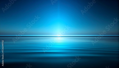 Tranquil blue sunrise over calm water