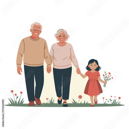 Grandparents and granddaughter walking together in a meadow