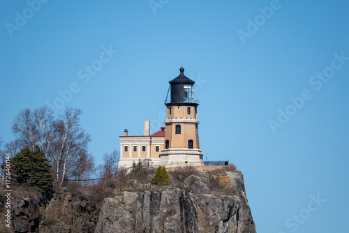 Split Rock Lighthouse on the cliff at the North Shore of Lake Superior on a sunny spring afternoon in Minnesota.
