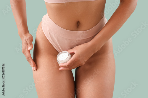 Young woman in underwear wi...