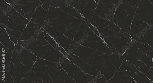 Elegant dark gray Nero Marquina marble surface with white mineral fractures and cracks