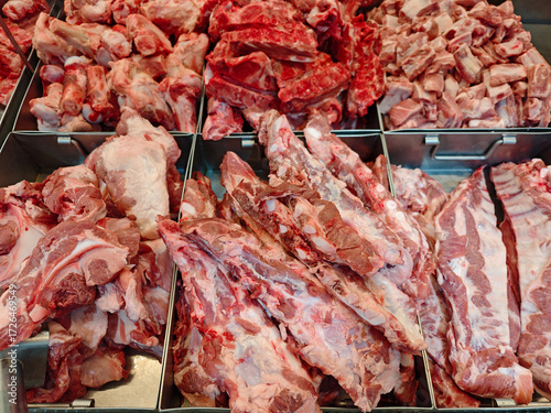 Fresh Cuts of Raw Meat Displayed at Butcher Shop