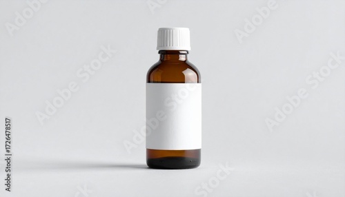 Amber glass bottle with white cap and blank label on light gray background—evokes pharmaceutical clarity, essential purity, and minimalist health symbolism in clean product composition.