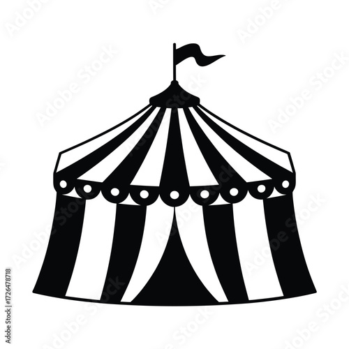 Classic black and white striped circus tent with flag on top
