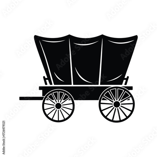 Silhouette of a vintage covered wagon with large spoked wheels and canvas top
