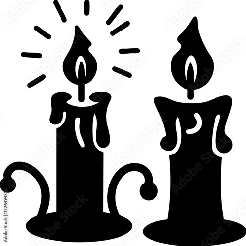 Two decorative candles with melting wax and glowing flames create cozy and warm atmosphere, perfect for festive occasions or intimate settings