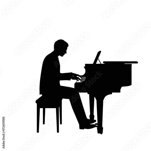 Man playing piano focused on music silhouette of a pianist seated at a grand piano concentrated on performance enjoying the music.