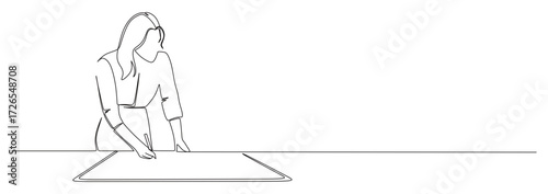 continuous line art of a female office worker checking a worksheet on a desk

