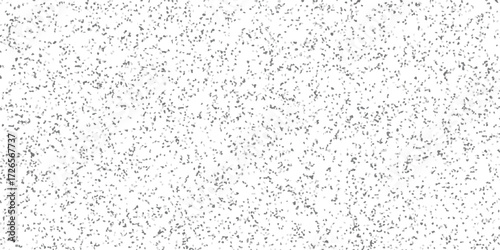 Subtle grey and white mosaic pattern with irregular small shapes creating a textured background effect
