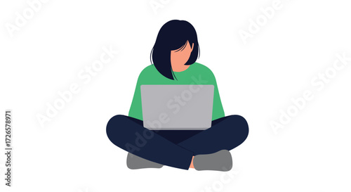 A person sitting cross-legged on the floor using a laptop.