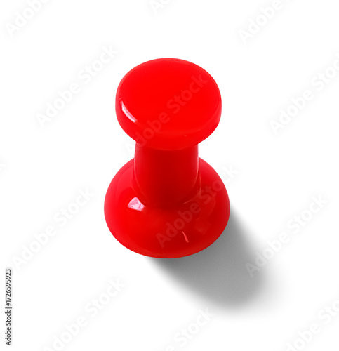 Isolated red plastic pushpin