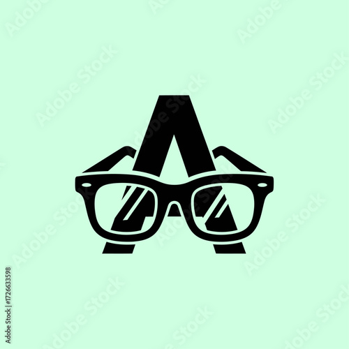 A black letter 'A' wearing a pair of black eyeglasses on a light green background, symbolizing intelligence and vision.