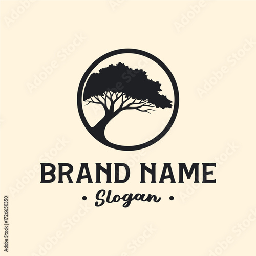 Black and white logo featuring a tree inside a circle with brand name and slogan.
