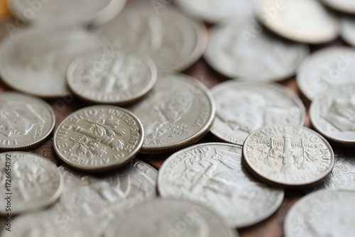 Pile with big amount of silver american cent coins as United States currency