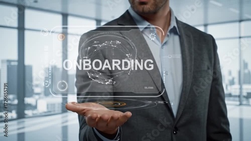 businessman holding futuristic onboarding hologram in office