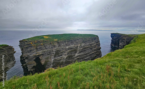 Wonderful views of the cliffs with islands and birds in the Scottish Highlands near Thurso