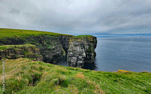 Wonderful views of the cliffs with islands and birds in the Scottish Highlands near Thurso