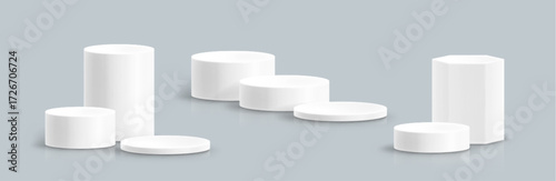 White cylindrical podium platforms on grey bg for stage display - various heights with round and hexagonal bases and smooth surfaces. Product presentation stands for showcase or exhibition layouts.
