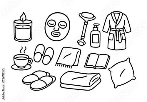 Cozy spa essentials: candle, face mask, massager, robe, slippers, blanket, pillow, tea