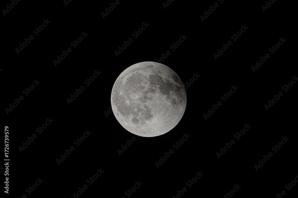 Obraz premium Partial lunar eclipse (ending phase)