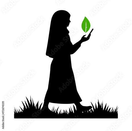 Black silhouette of woman in hijab holding smartphone with green leaf icon