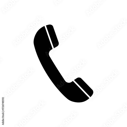 Black and white telephone handset icon.