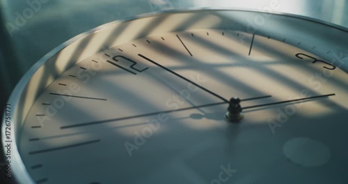 Time Lapse of Minimalist Wall Clock with Dial and Running Hour, Minute and Second Hands. Modern Design Element of Interior. Concept of Change of Time of Day Time, Time Management, Lifestyle. Close Up.