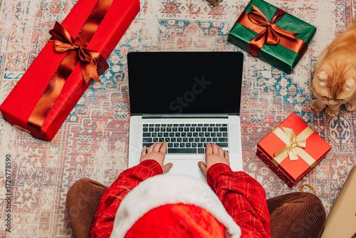 woman searches for Christmas presents online