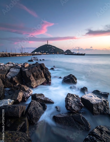 Coastal sunset with rocks