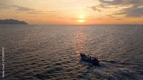 Morning lifestyle of fishermen at sea. Royalty high-quality free best stock of  tropical sunrise with golden light, traditional culture and scenic travel destination. lifestyle and scenic seascape in 