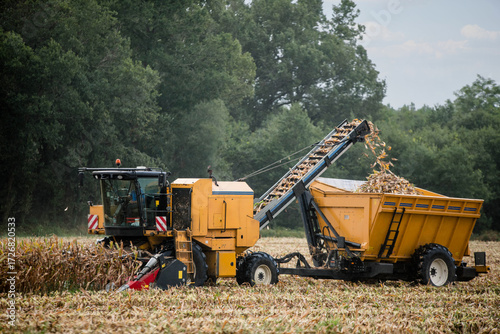 Combine harvester harvesting corncobs.