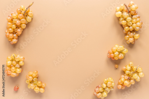 Many bunches of ripe yellow grapes, top view